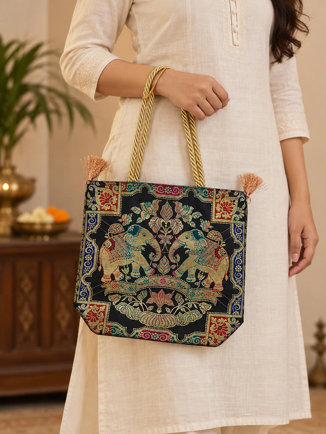 Black - Twin Elephants Banarasi bag - Model holding the bag